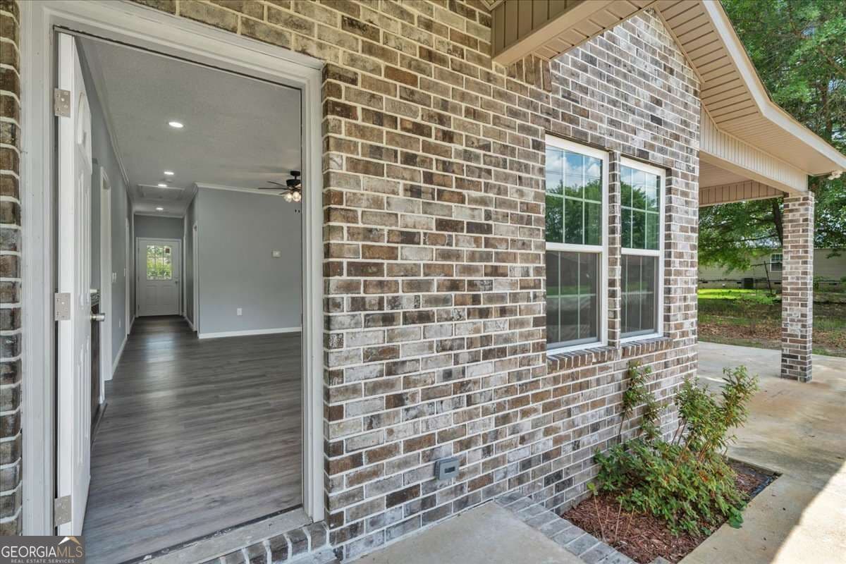 4 bedroom, 2 bathroom, 1,616 sq ft single family residence for sale at 104 Robinson Street, Byron, GA 31008 — photo 3