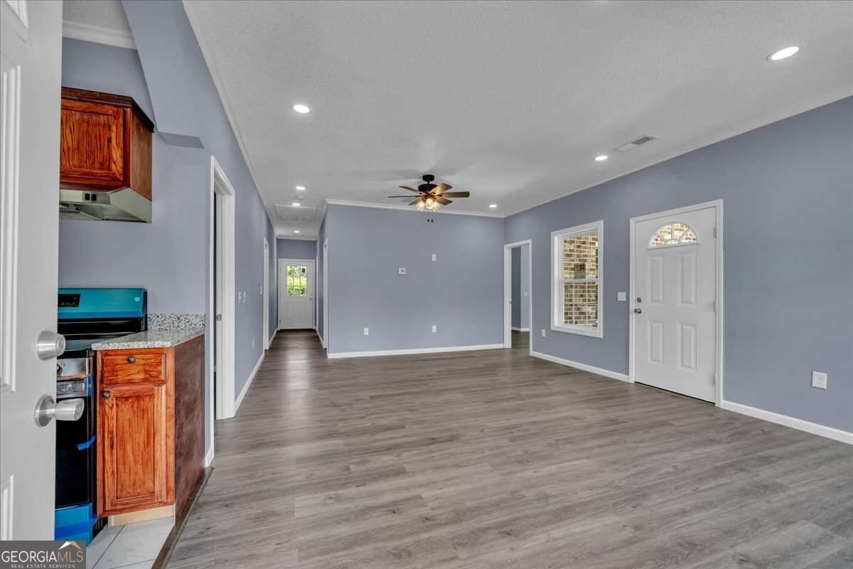 4 bedroom, 2 bathroom, 1,616 sq ft single family residence for sale at 104 Robinson Street, Byron, GA 31008 — photo 4