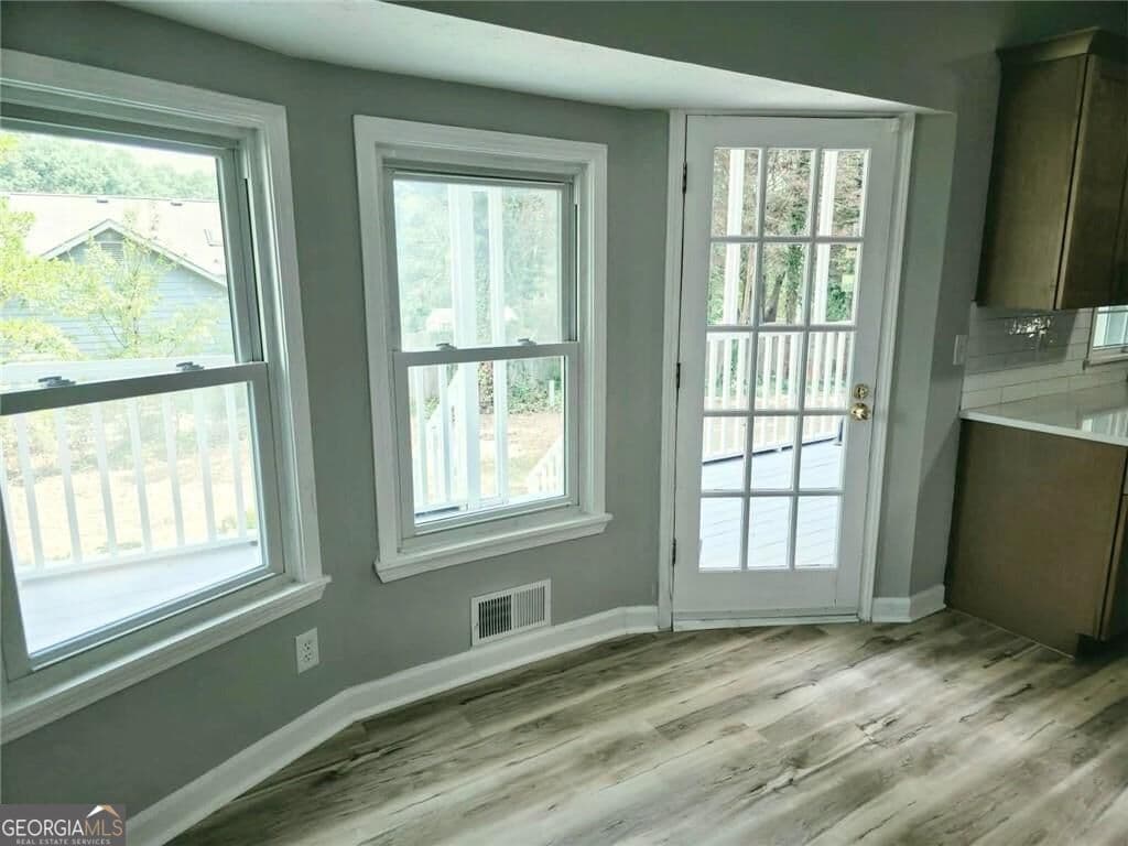 4 bedroom, 2.5 bathroom single family residence for sale at 1620 Summit View Way, Snellville, GA 30078 — photo 6