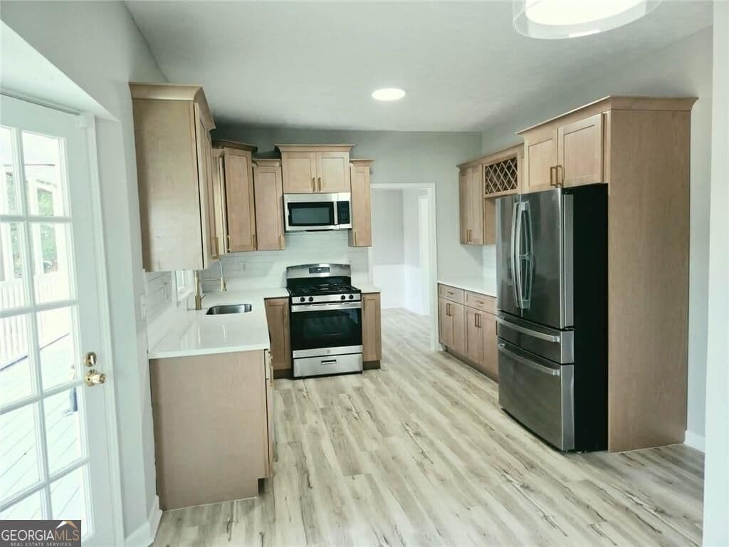 4 bedroom, 2.5 bathroom single family residence for sale at 1620 Summit View Way, Snellville, GA 30078 — photo 7