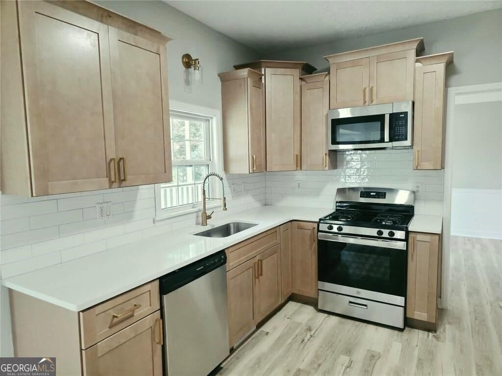 4 bedroom, 2.5 bathroom single family residence for sale at 1620 Summit View Way, Snellville, GA 30078 — photo 8