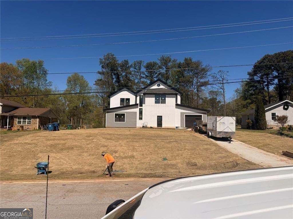 4 bedroom, 3.5 bathroom, 3,324 sq ft single family residence for sale at 551 Plantation Boulevard, Lawrenceville, GA 30046 — photo 1 of 14