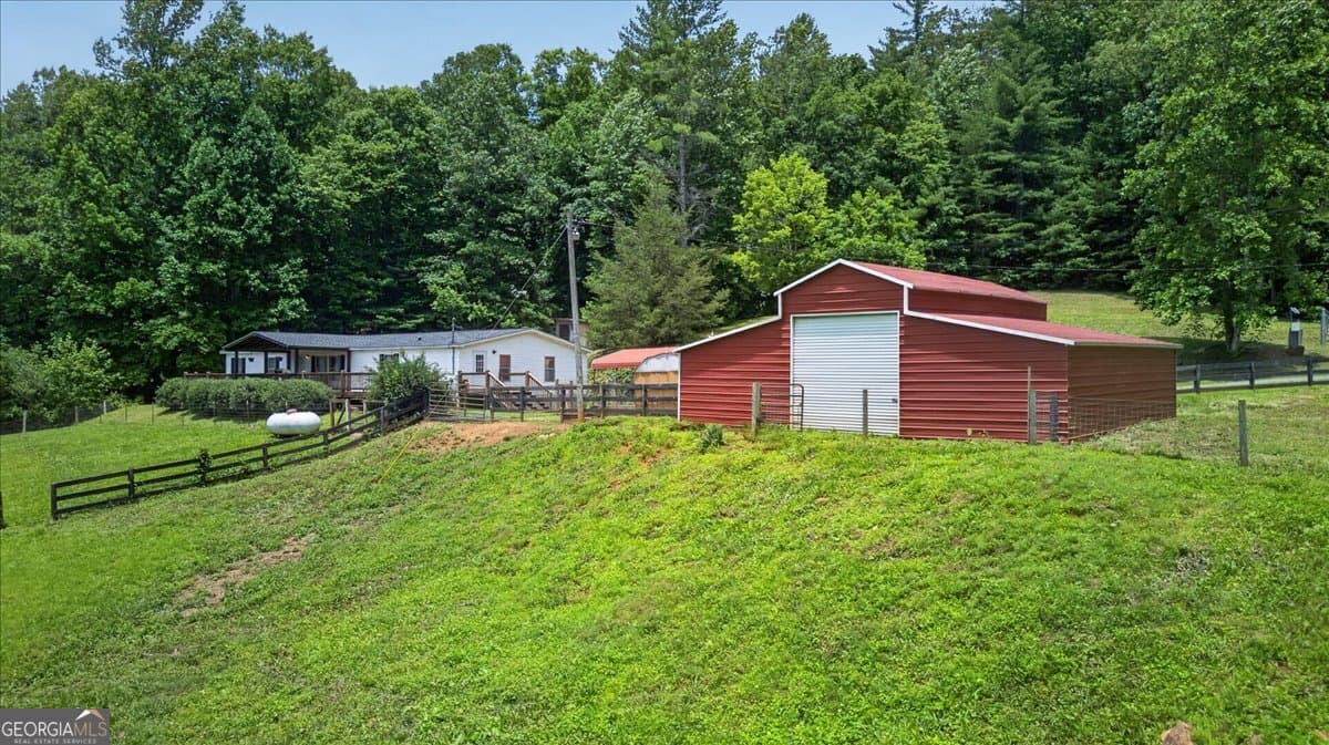 3 bedroom, 2 bathroom, 1,980 sq ft manufactured home,single family residence sold at 743 Sam Hill Road, Ellijay, GA 30540
