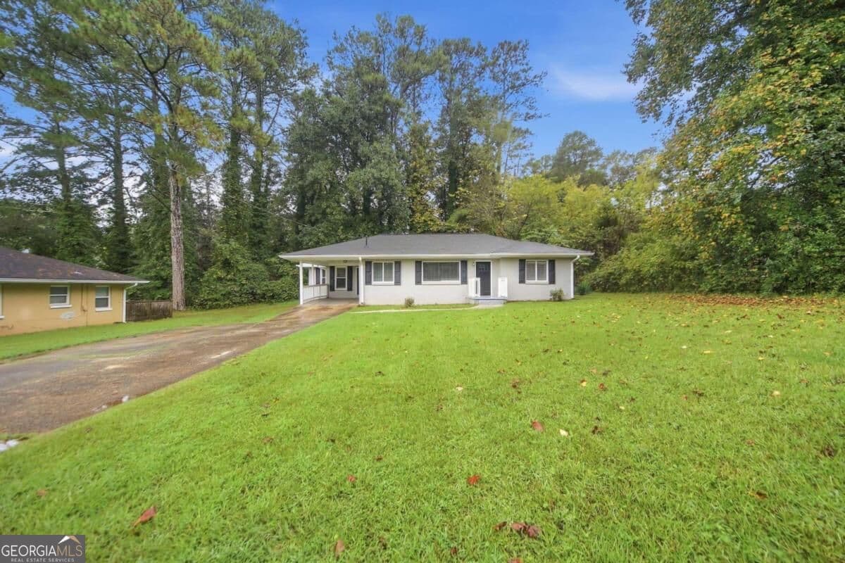5 bedroom, 2 bathroom, 1,801 sq ft single family residence for sale at 4315 Mercer Road, Decatur, GA 30035 — photo 1 of 29