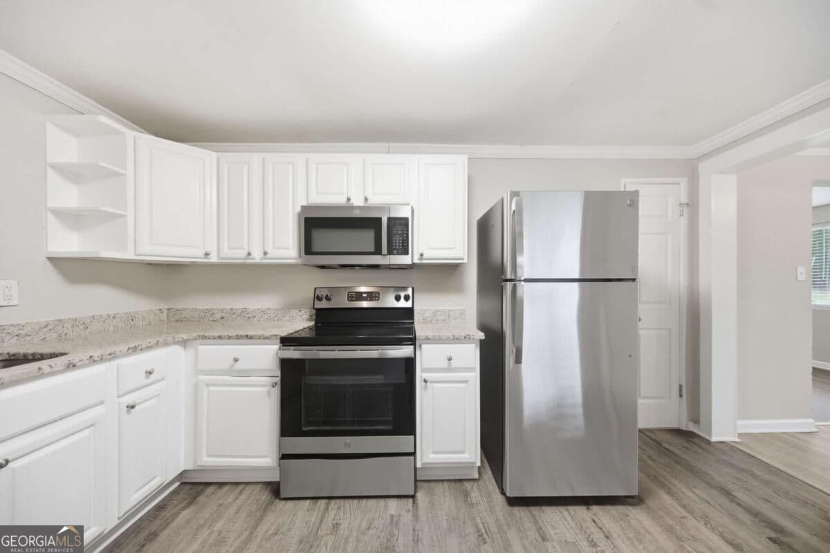 5 bedroom, 2 bathroom, 1,801 sq ft single family residence for sale at 4315 Mercer Road, Decatur, GA 30035 — photo 9