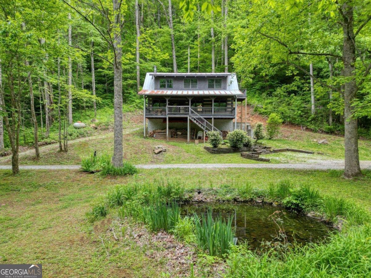 2 bedroom, 2 bathroom, 1,683 sq ft cabin,single family residence for sale at 180 Dream Catcher Cove, Hayesville, NC 28904 — photo 1 of 44