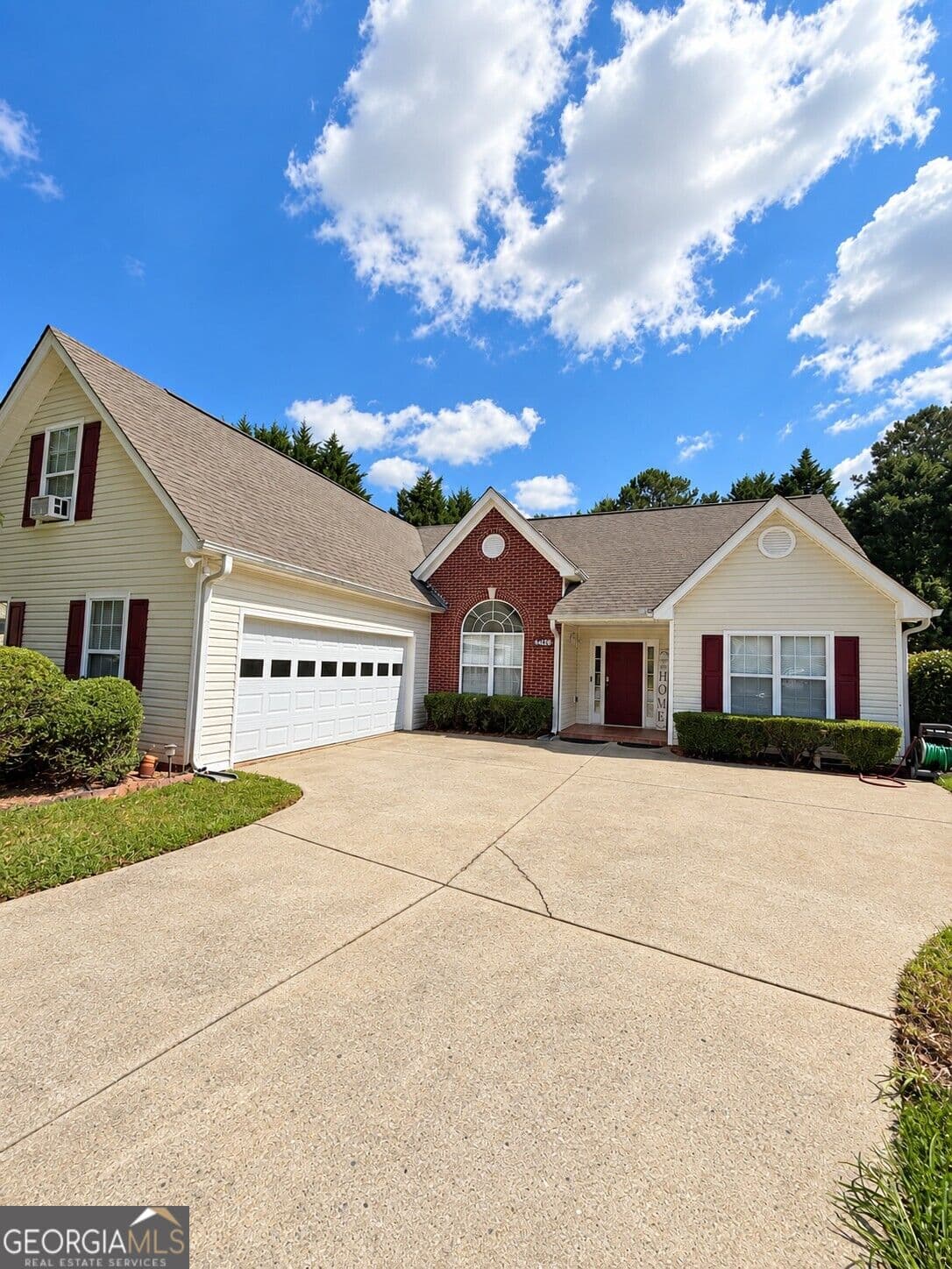 4 bedroom, 2 bathroom, 1,940 sq ft single family residence for sale at 2214 Oakland Farm Drive, Lawrenceville, GA 30044 — photo 2