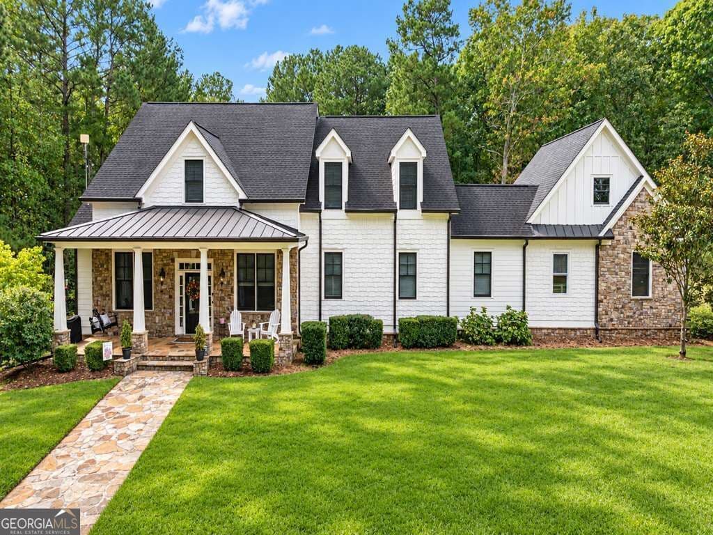 6 bedroom, 4 bathroom, 6,586 sq ft single family residence for sale at 4478 Cedarcrest Road, Acworth, GA 30101 — photo 1 of 41