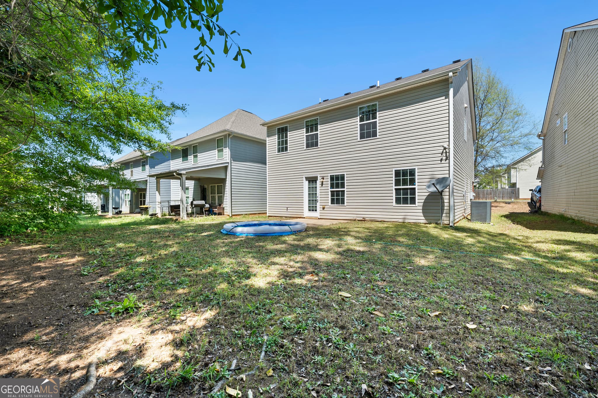 4 bedroom, 2.5 bathroom, 2,156 sq ft single family residence for sale at 1883 Simmons Lane, Hampton, GA 30228 — photo 3
