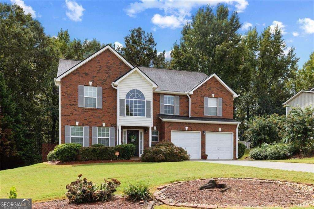 5 bedroom, 3.5 bathroom, 3,058 sq ft single family residence for sale at 1835 Winding Crossing Trail, Fairburn, GA 30213 — photo 2
