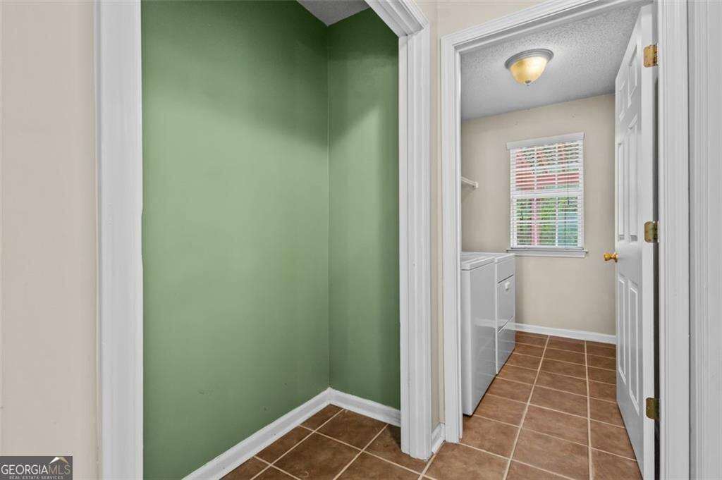 5 bedroom, 3.5 bathroom, 3,058 sq ft single family residence for sale at 1835 Winding Crossing Trail, Fairburn, GA 30213 — photo 7