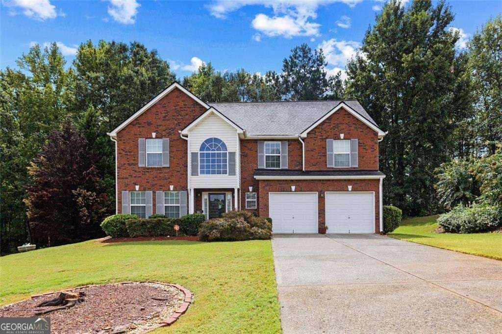 5 bedroom, 3.5 bathroom, 3,058 sq ft single family residence for sale at 1835 Winding Crossing Trail, Fairburn, GA 30213 — photo 1 of 38