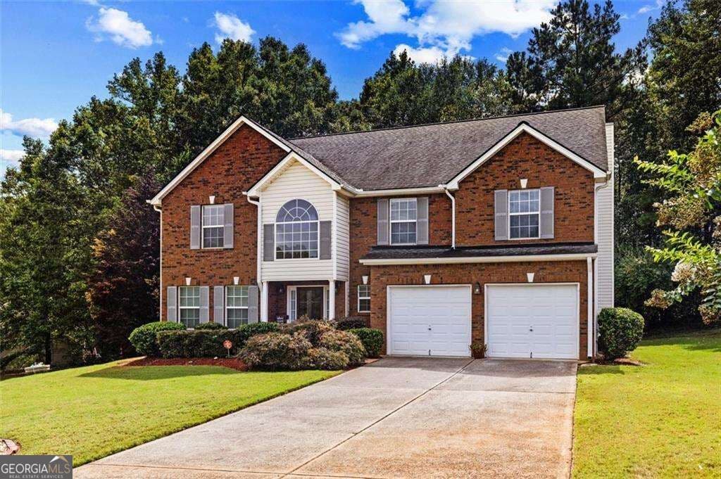 5 bedroom, 3.5 bathroom, 3,058 sq ft single family residence for sale at 1835 Winding Crossing Trail, Fairburn, GA 30213 — photo 4
