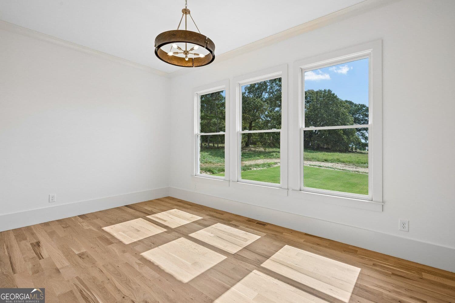5 bedroom, 4.5 bathroom, 3,535 sq ft single family residence for sale at 1983 Malcom Estates Drive, Bogart, GA 30622 — photo 9