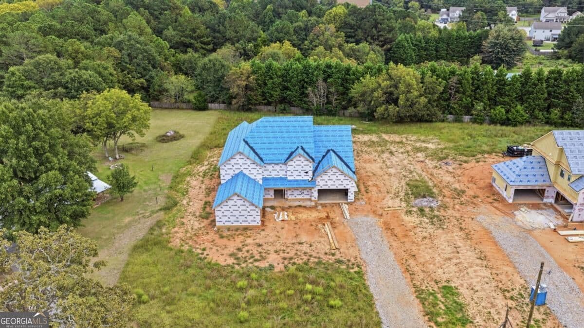 5 bedroom, 5.5 bathroom, 5,500 sq ft single family residence for sale at 1752 Lee Peters Road, Loganville, GA 30052 — photo 2