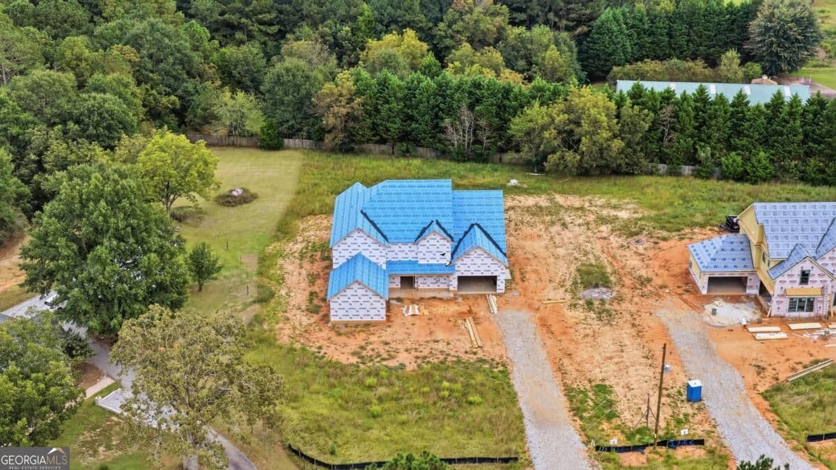 5 bedroom, 5.5 bathroom, 5,500 sq ft single family residence for sale at 1752 Lee Peters Road, Loganville, GA 30052 — photo 6