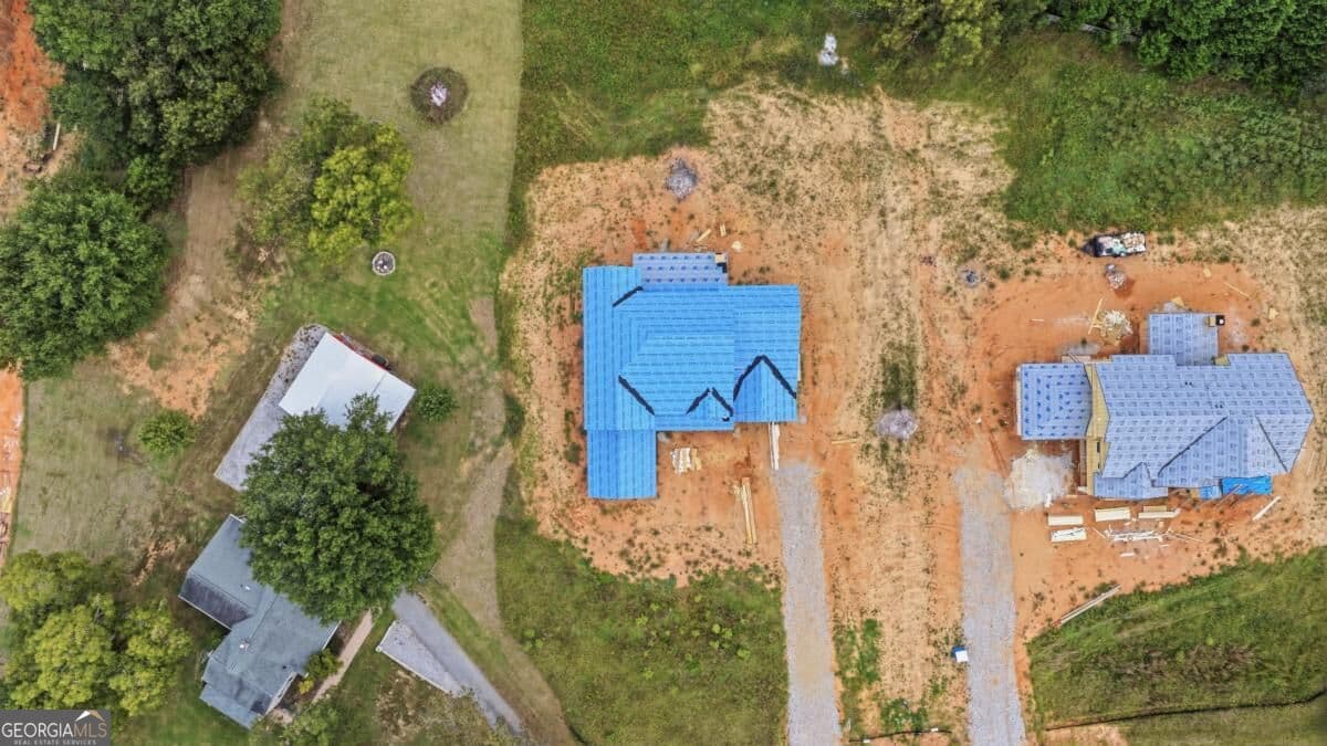 5 bedroom, 5.5 bathroom, 5,500 sq ft single family residence for sale at 1752 Lee Peters Road, Loganville, GA 30052 — photo 3