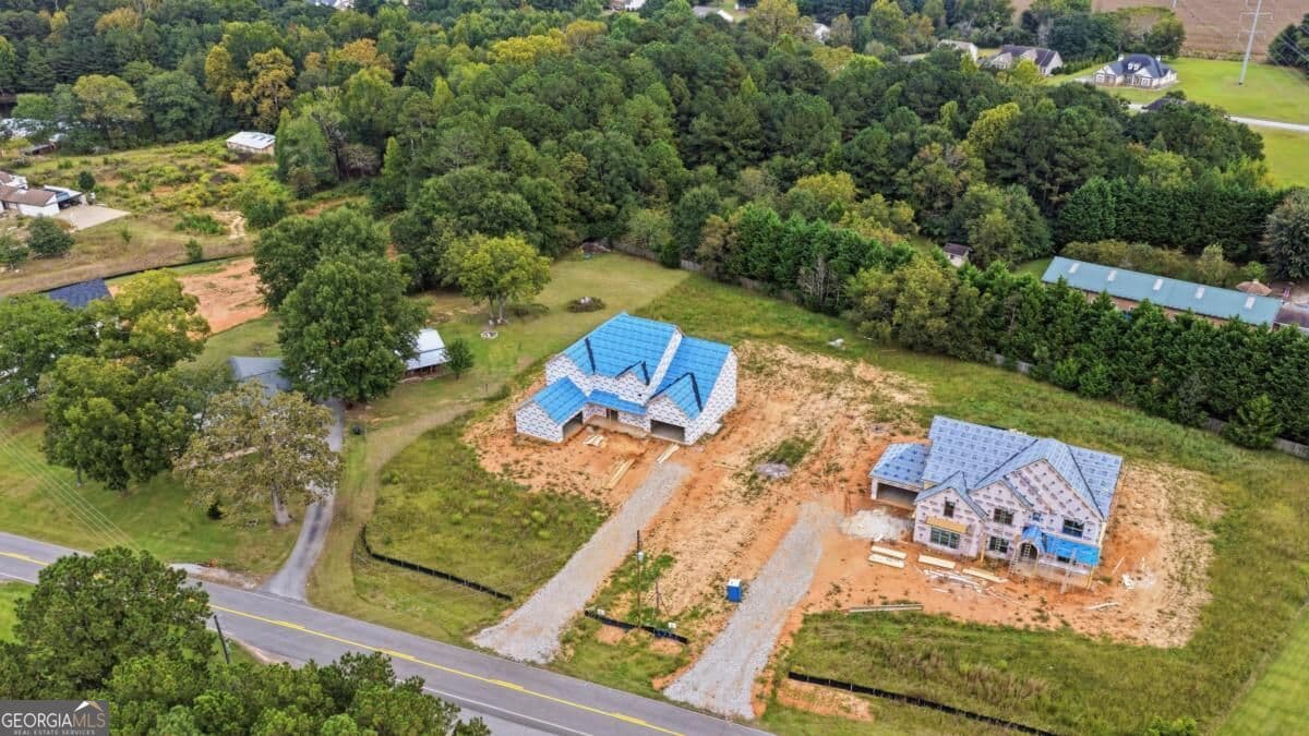 5 bedroom, 5.5 bathroom, 5,500 sq ft single family residence for sale at 1752 Lee Peters Road, Loganville, GA 30052 — photo 4