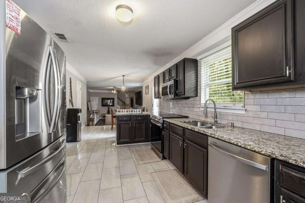 5 bedroom, 3 bathroom, 3,492 sq ft single family residence for sale at 208 Sheffield Lane, Powder Springs, GA 30127 — photo 3
