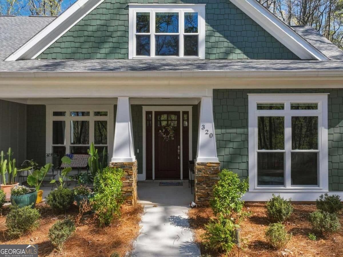 4 bedroom, 3 bathroom, 3,037 sq ft single family residence for sale at 320 Fern Park Drive, Dawsonville, GA 30534 — photo 1 of 59