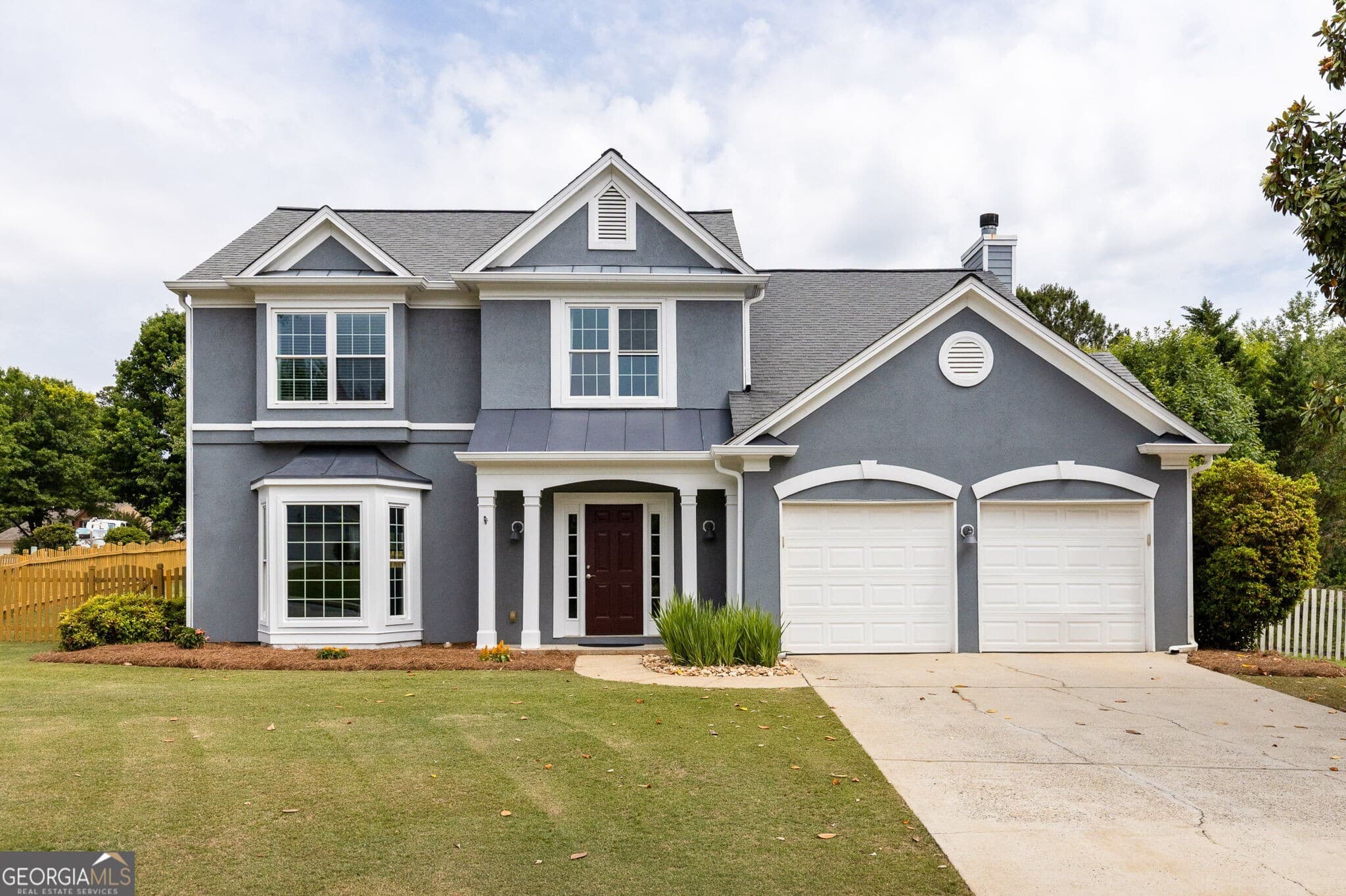 4 bedroom, 2.5 bathroom, 2,255 sq ft single family residence sold at 7205 Brassfield Drive, Cumming, GA 30041