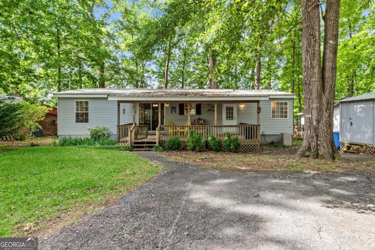 3 bedroom, 2 bathroom, 1,404 sq ft manufactured home,single family residence for sale at 194 Phillips Road, Eatonton, GA 31024 — photo 1 of 57