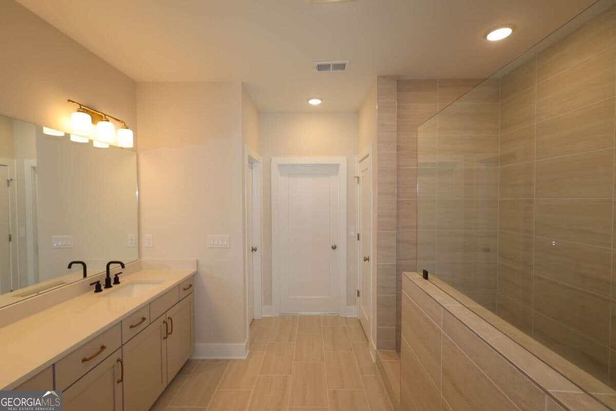 4 bedroom, 4 bathroom, 3,008 sq ft single family residence for sale at 339 Beebalm Street, Woodstock, GA 30188 — photo 6