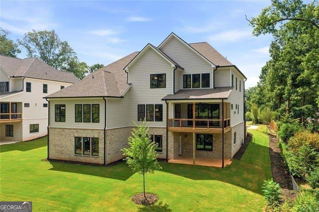 6 bedroom, 5.5 bathroom, 4,735 sq ft single family residence for sale at 1976 Highgrove Court, Atlanta, GA 30345 — photo 2