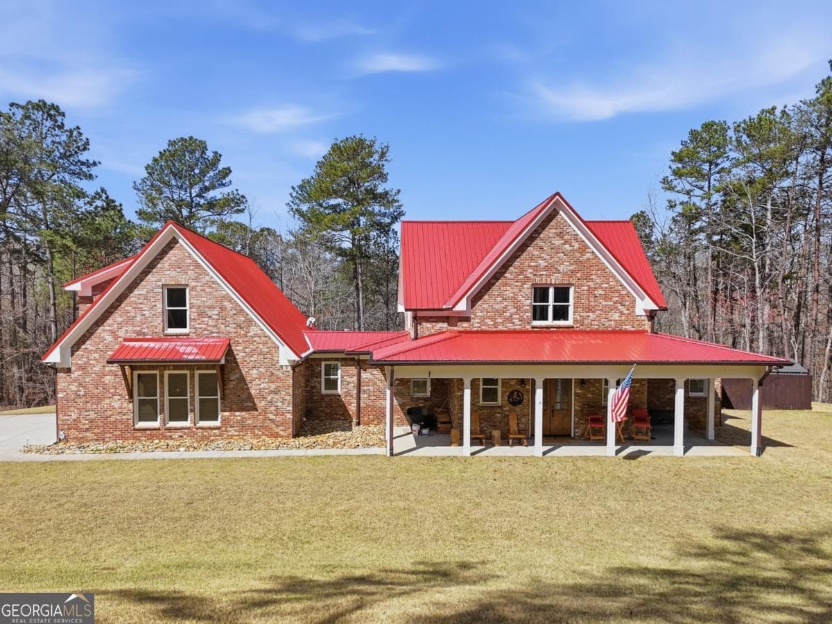 4 bedroom, 3 bathroom, 3,812 sq ft single family residence for sale at 864 Blackberry Trail, Ball Ground, GA 30107 — photo 4