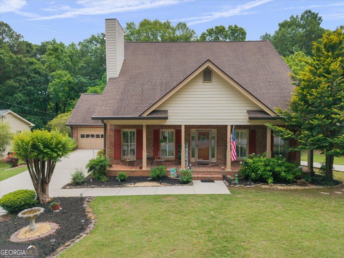 4 bedroom, 3.5 bathroom, 3,945 sq ft single family residence sold at 4145 SW Town Branch Court, Covington, GA 30014