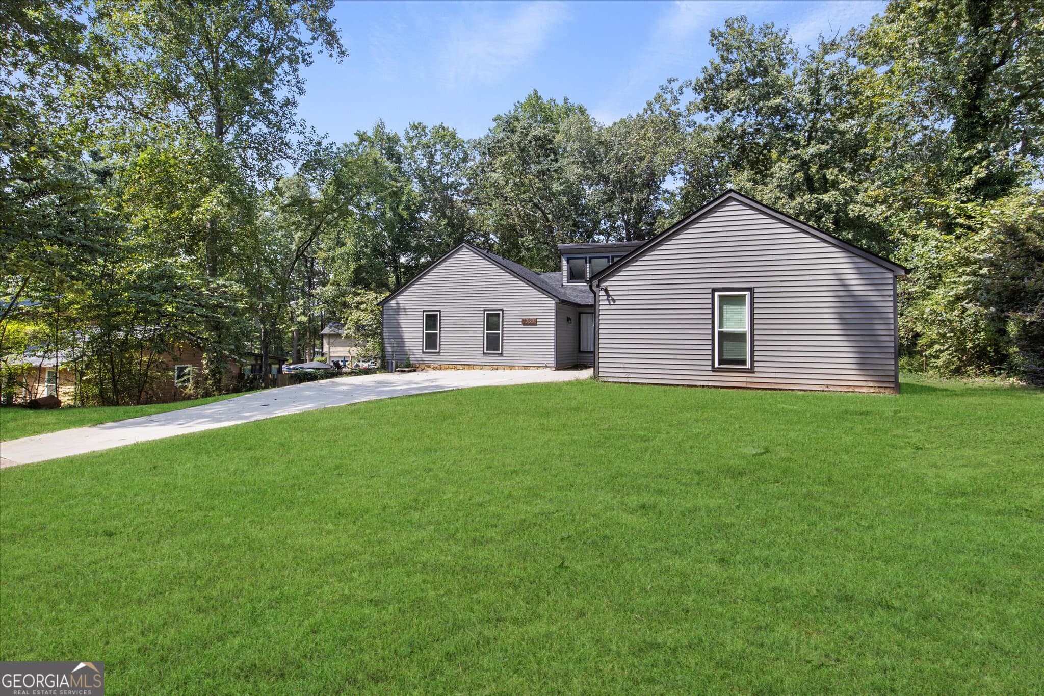 4 bedroom, 3 bathroom, 3,608 sq ft single family residence for sale at 1060 Deer Chase, Stone Mountain, GA 30088 — photo 2