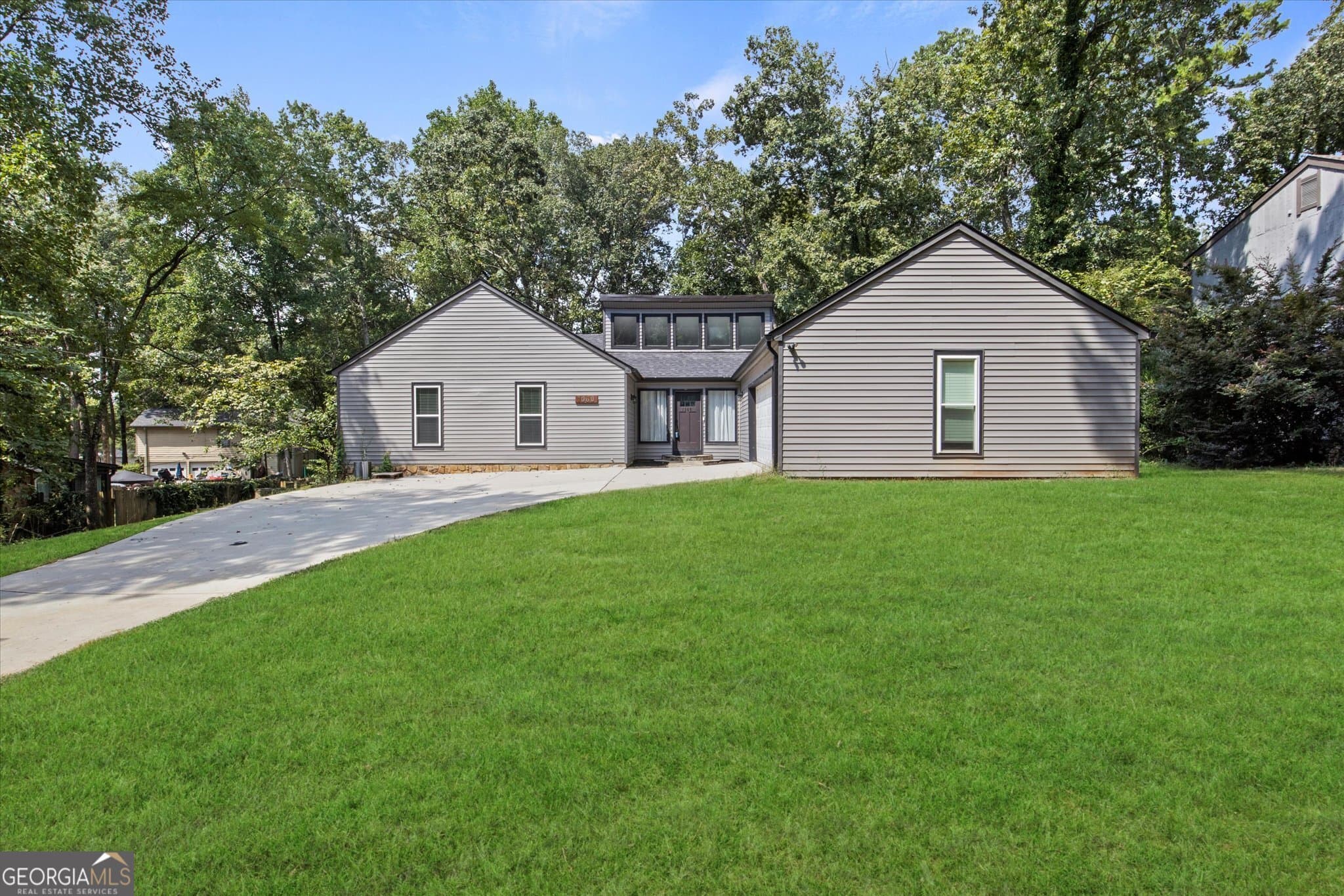 4 bedroom, 3 bathroom, 3,608 sq ft single family residence for sale at 1060 Deer Chase, Stone Mountain, GA 30088