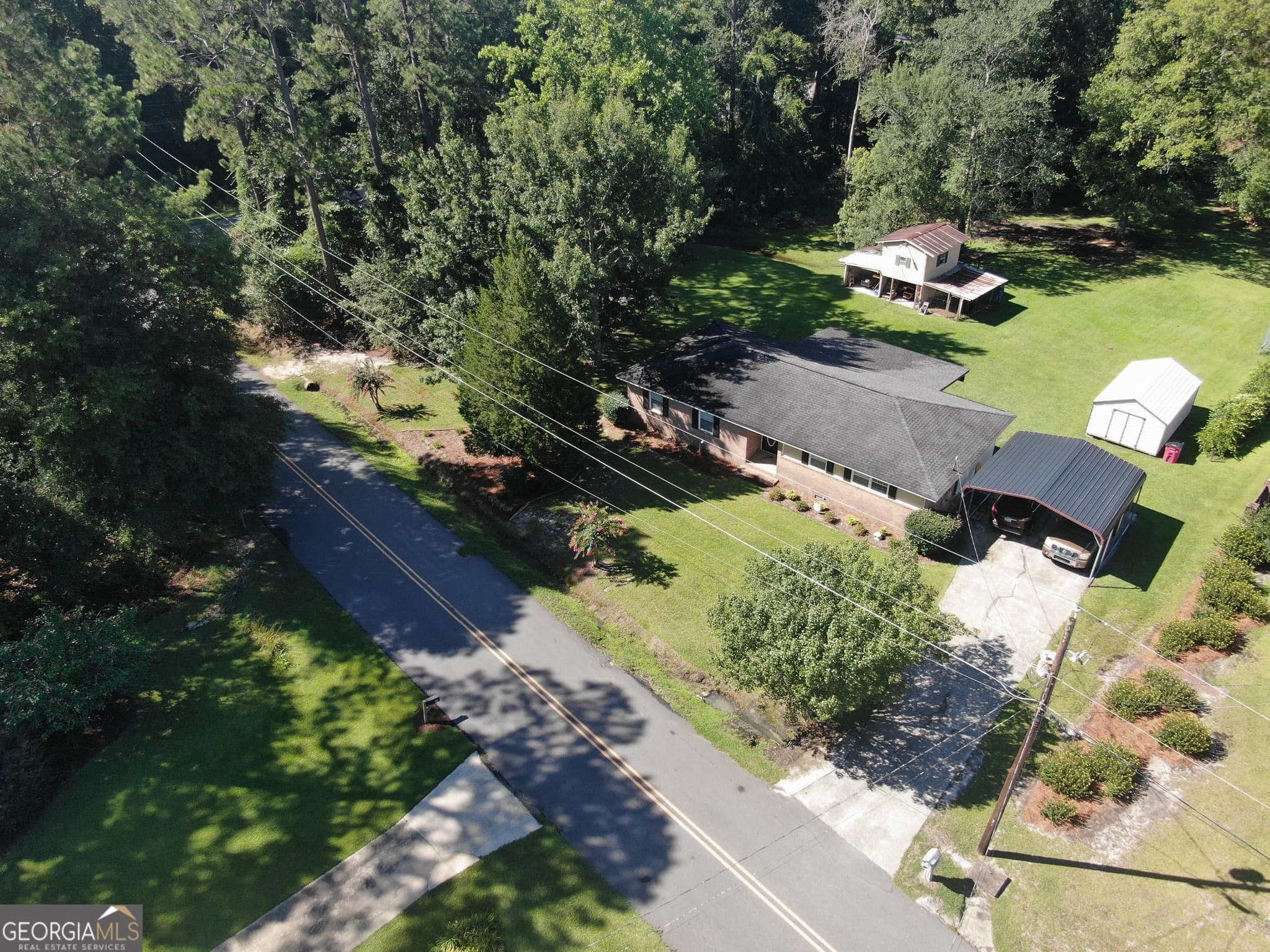 3 bedroom, 2 bathroom, 1,656 sq ft single family residence for sale at 94 E Bruce Street, Mcrae-Helena, GA 31055 — photo 2
