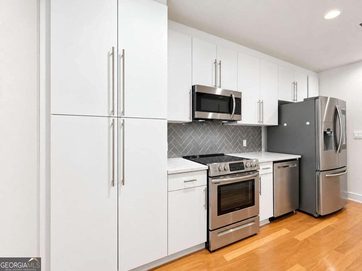 1 bedroom, 1.5 bathroom, 895 sq ft condominium for sale at 44 Peachtree Place 634, Atlanta, GA 30309 — photo 9