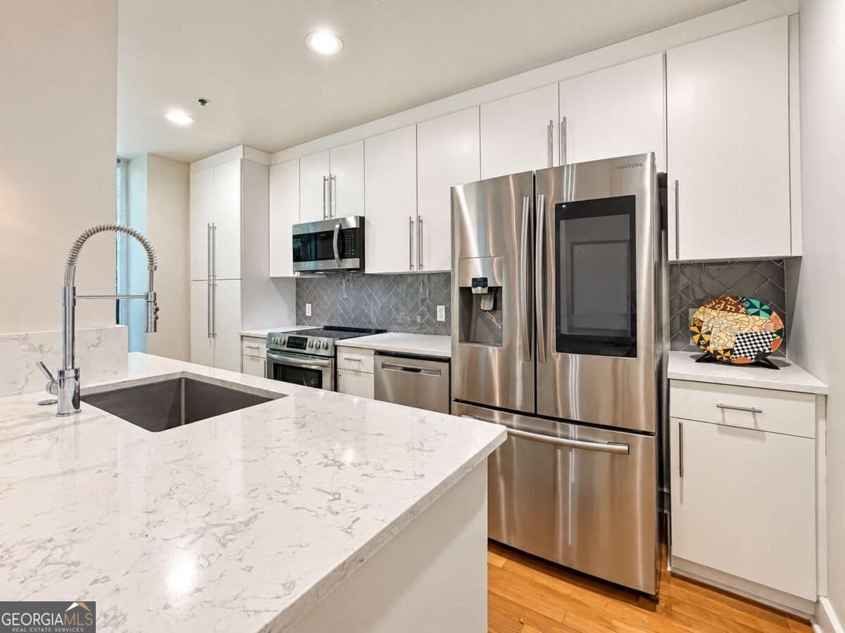 1 bedroom, 1.5 bathroom, 895 sq ft condominium for sale at 44 Peachtree Place 634, Atlanta, GA 30309 — photo 8