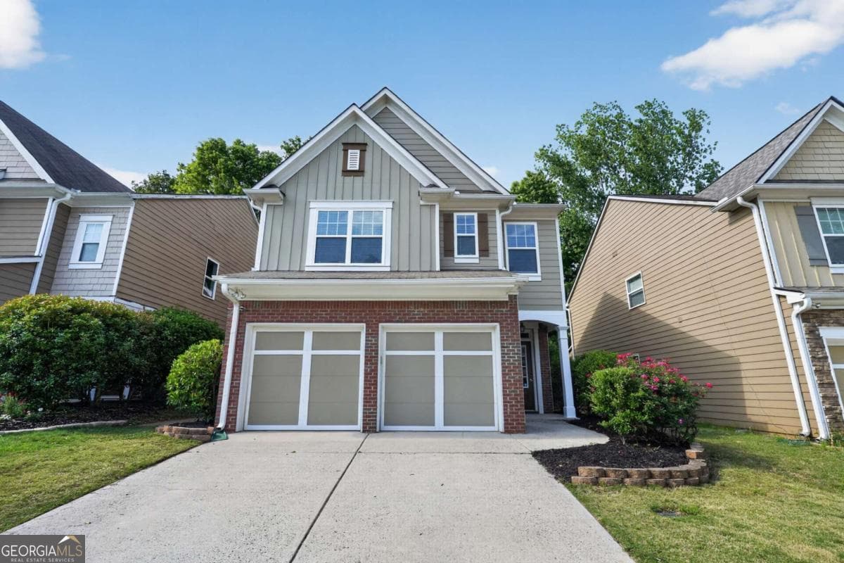 4 bedroom, 2.5 bathroom, 1,956 sq ft single family residence for sale at 5750 Crestwick Way, Cumming, GA 30040 — photo 2