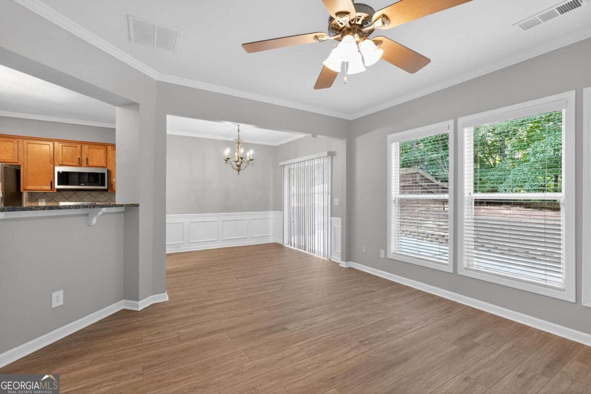 4 bedroom, 2.5 bathroom, 1,956 sq ft single family residence for sale at 5750 Crestwick Way, Cumming, GA 30040 — photo 6