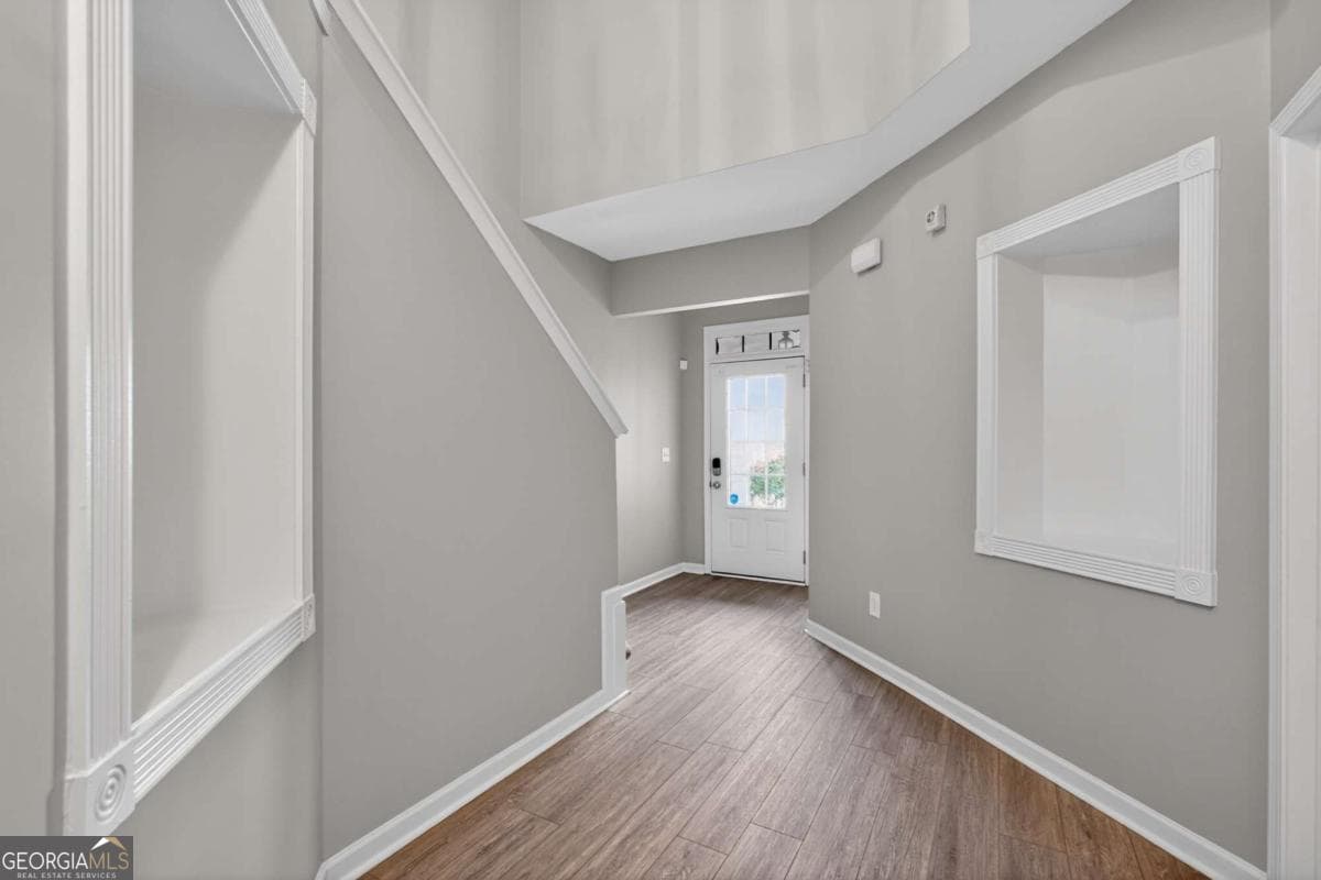 4 bedroom, 2.5 bathroom, 1,956 sq ft single family residence for sale at 5750 Crestwick Way, Cumming, GA 30040 — photo 3