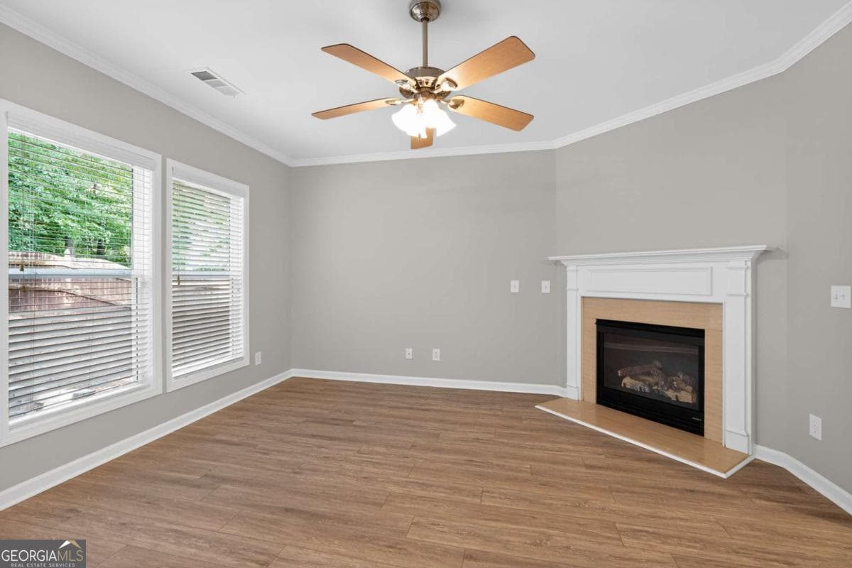 4 bedroom, 2.5 bathroom, 1,956 sq ft single family residence for sale at 5750 Crestwick Way, Cumming, GA 30040 — photo 5