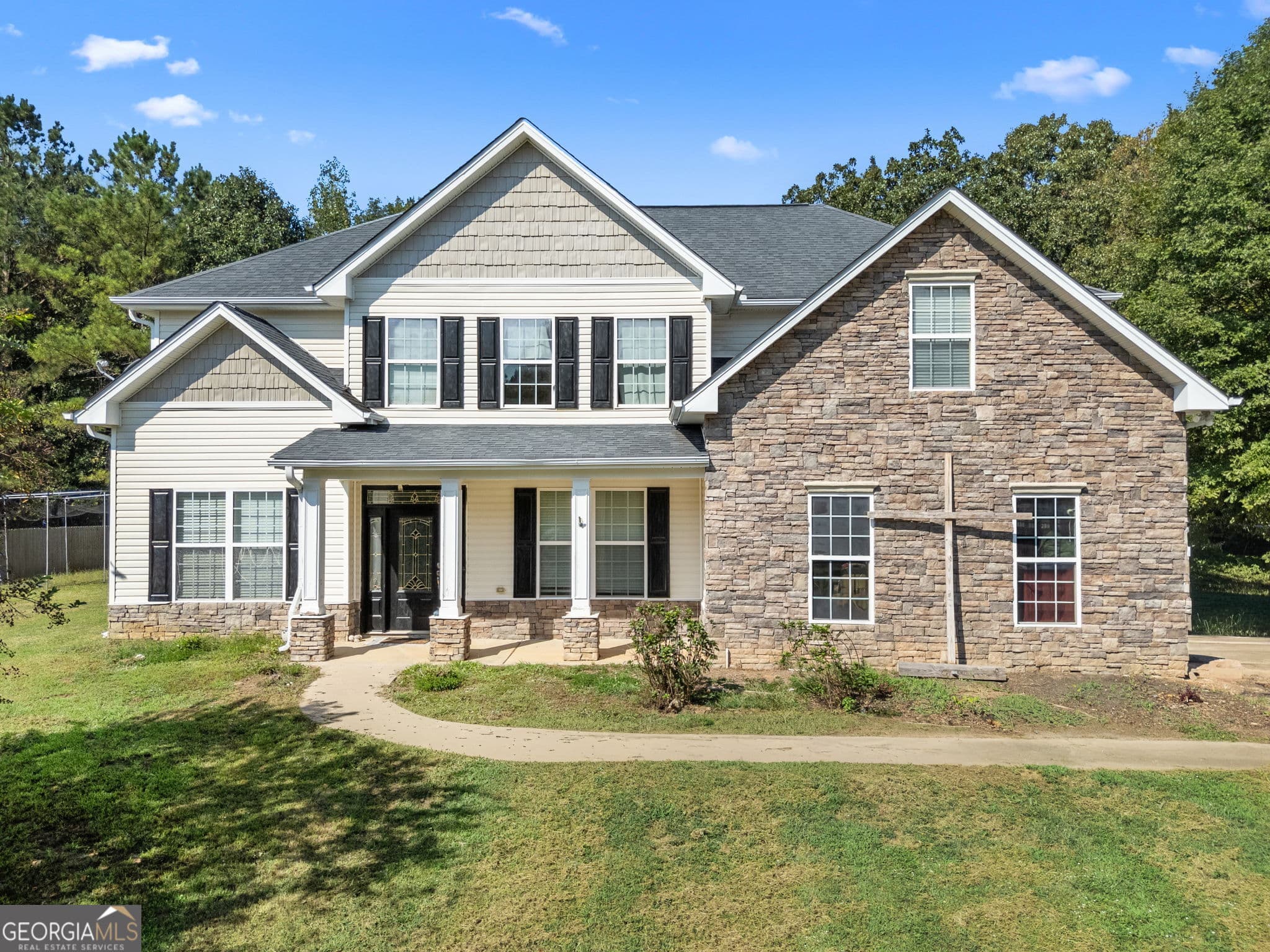 5 bedroom, 3 bathroom, 3,093 sq ft single family residence for sale at 206 Liberty Trace, Milner, GA 30257