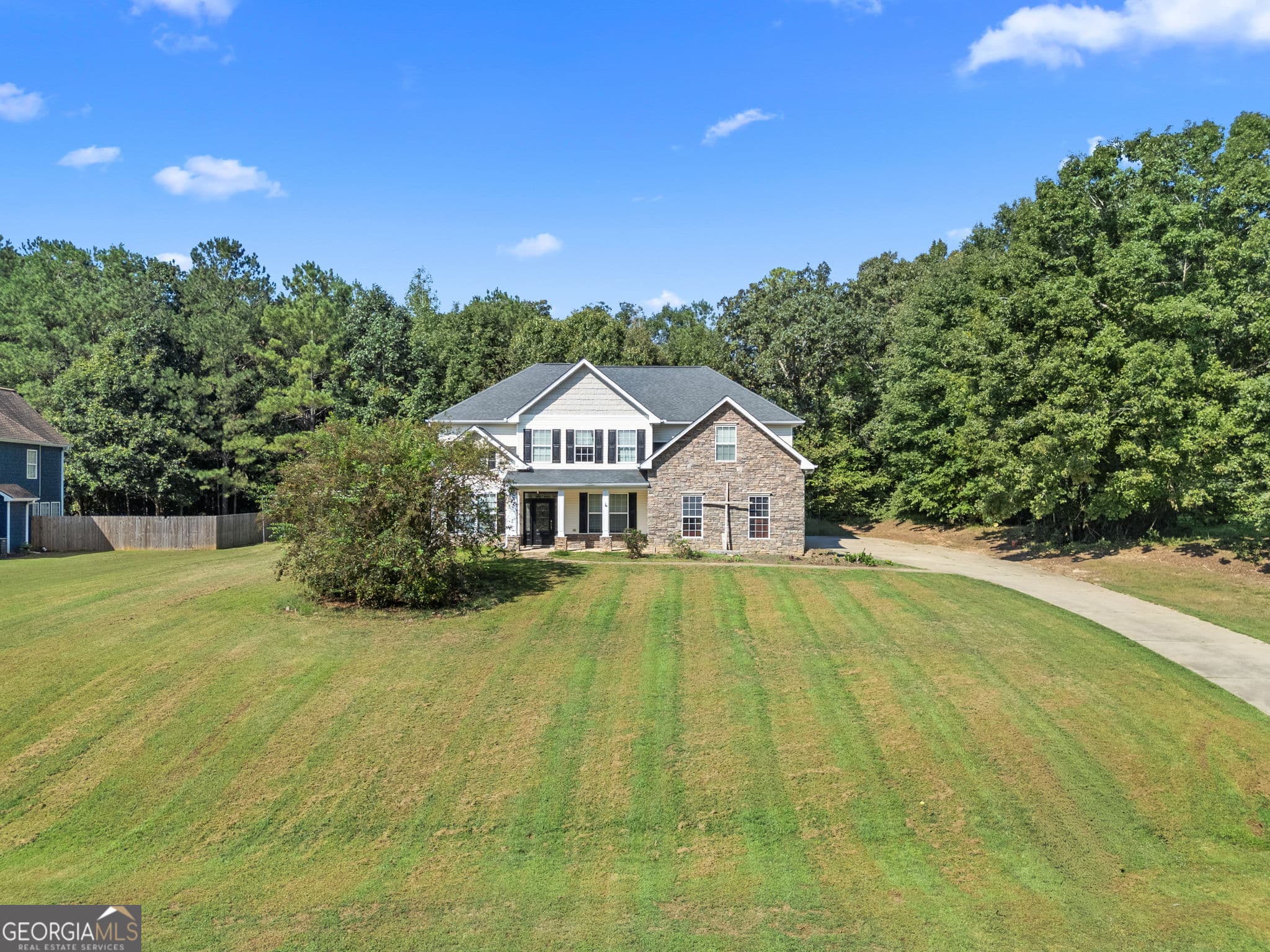 5 bedroom, 3 bathroom, 3,093 sq ft single family residence for sale at 206 Liberty Trace, Milner, GA 30257 — photo 4