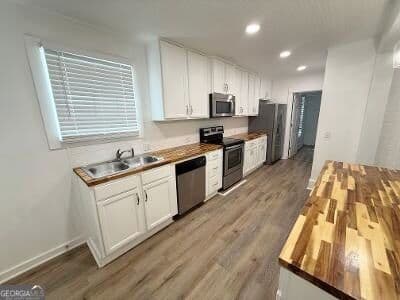 3 bedroom, 1.5 bathroom, 1,716 sq ft single family residence for sale at 411 W Pine Street, Swainsboro, GA 30401 — photo 7