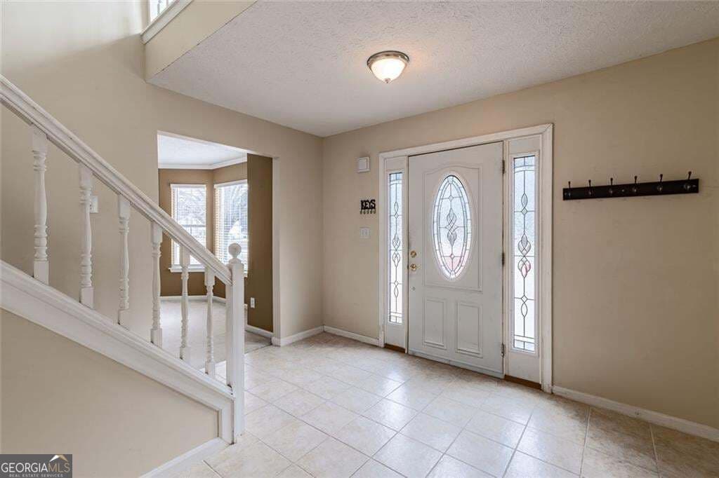 4 bedroom, 2.5 bathroom, 2,869 sq ft single family residence for sale at 2167 Pixie Rose Lane, Loganville, GA 30052 — photo 8