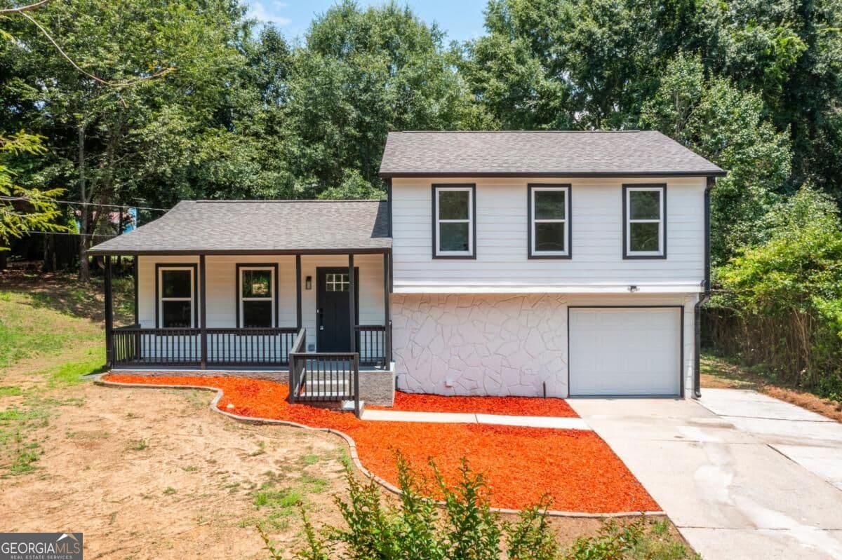 3 bedroom, 2 bathroom single family residence for sale at 847 Halfmoon Hollow, Lilburn, GA 30047 — photo 1 of 52
