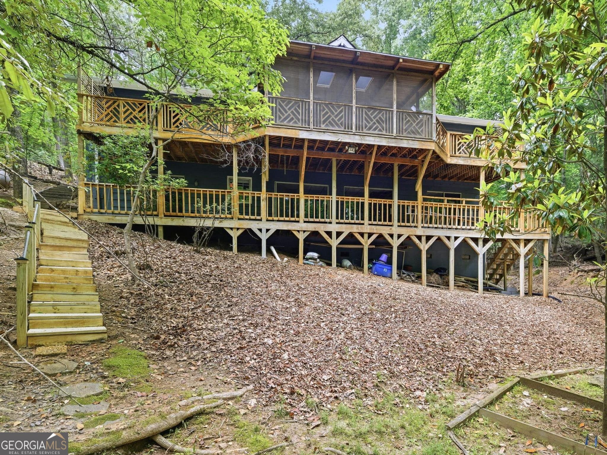 5 bedroom, 4 bathroom, 3,354 sq ft single family residence for sale at 7755 Kings Point Drive, Cumming, GA 30041 — photo 2