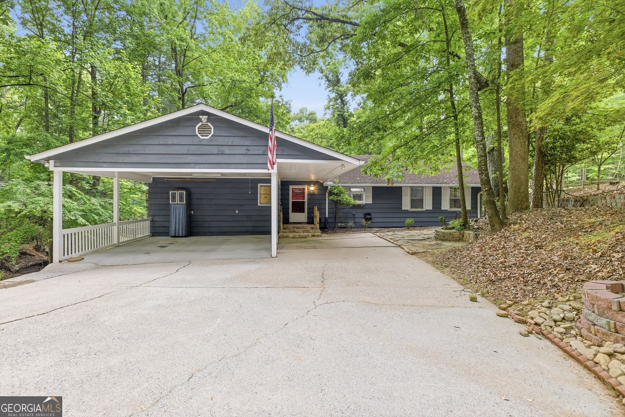 5 bedroom, 4 bathroom, 3,354 sq ft single family residence for sale at 7755 Kings Point Drive, Cumming, GA 30041 — photo 1 of 69