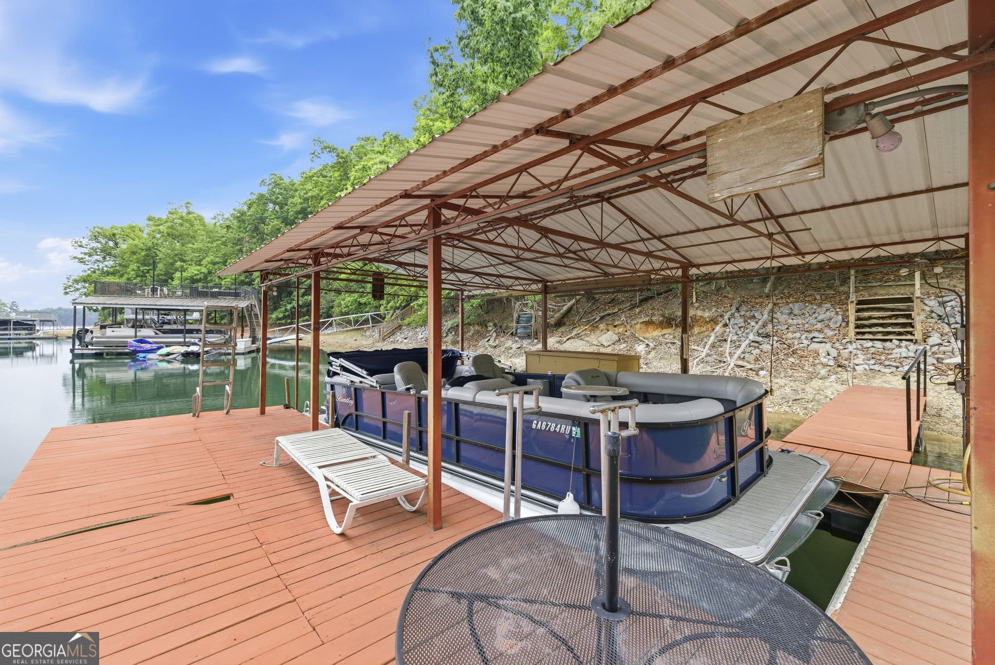 5 bedroom, 4 bathroom, 3,354 sq ft single family residence for sale at 7755 Kings Point Drive, Cumming, GA 30041 — photo 5