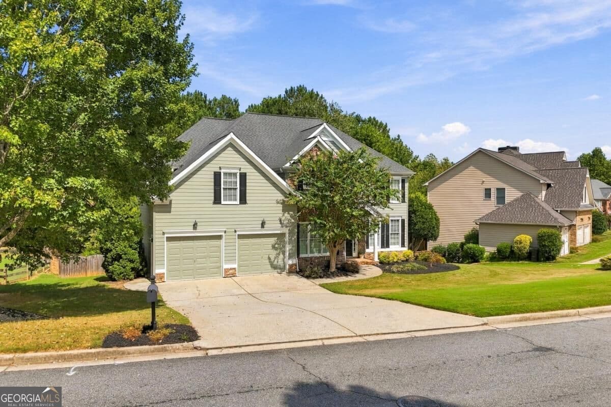 5 bedroom, 4 bathroom, 4,556 sq ft single family residence for sale at 5205 Millwood Drive, Canton, GA 30114 — photo 2