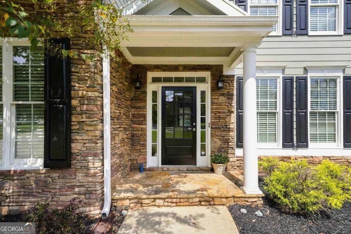 5 bedroom, 4 bathroom, 4,556 sq ft single family residence for sale at 5205 Millwood Drive, Canton, GA 30114 — photo 4