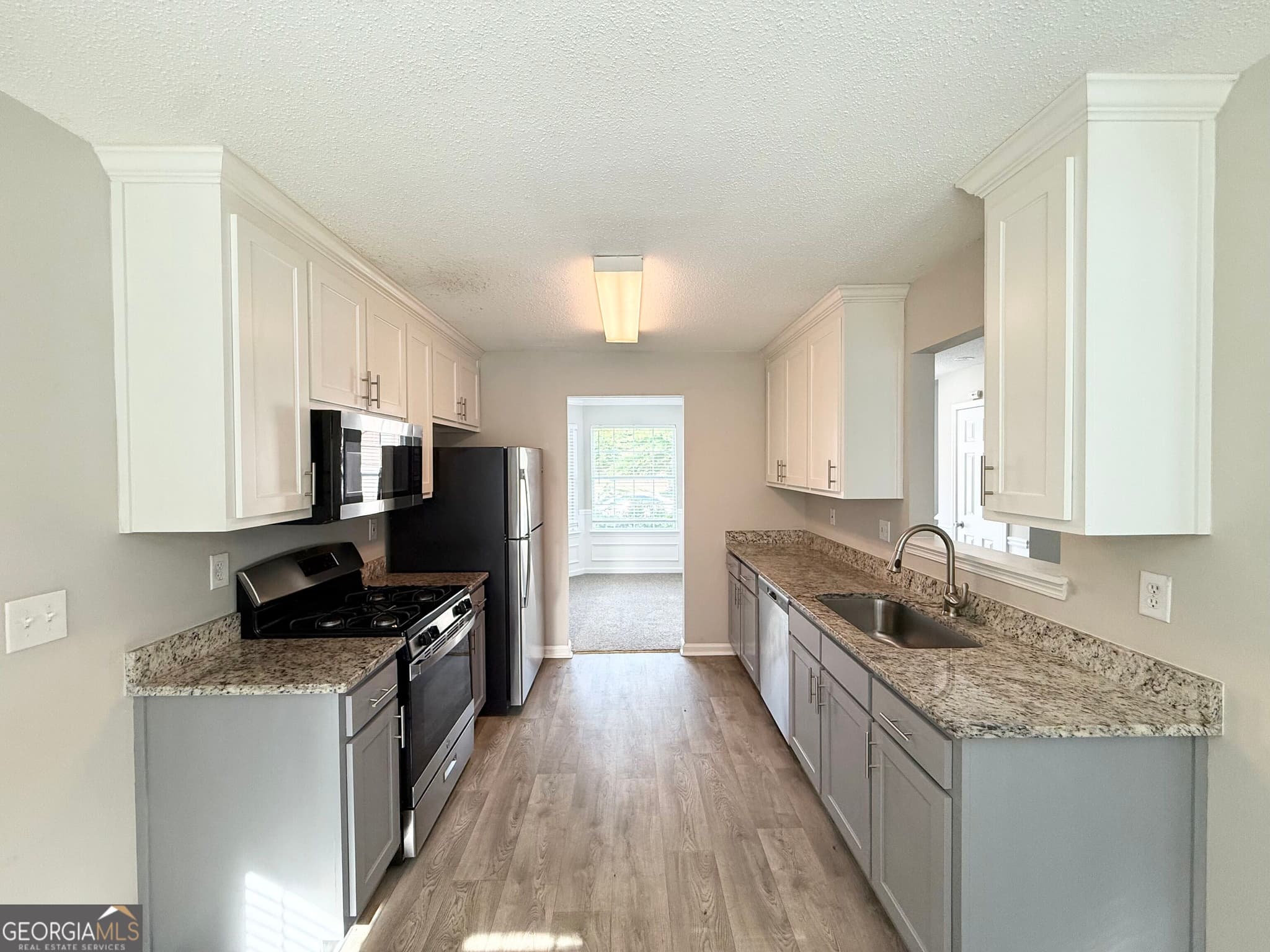 4 bedroom, 2.5 bathroom, 1,648 sq ft single family residence for sale at 4691 Derby Loop, Fairburn, GA 30213 — photo 5